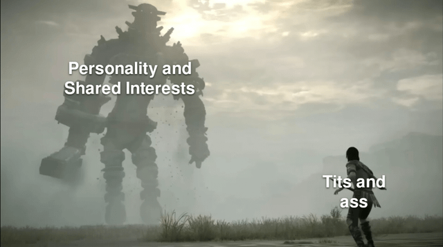 A meme image depicting a dramatic visual comparison. On the left side, a large, imposing robot-like figure towers over a misty, desolate landscape, labeled 'Personality and Shared Interests'. On the right, a smaller human figure stands facing the robot, labeled 'Tits and ass'. The stark size difference between the two elements visually conveys the meme's message: emphasizing that personality and shared interests are far more substantial or important compared to physical attributes, using sarcasm to critique societal priorities in attraction.