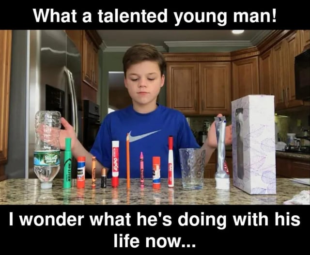 This meme features a real pre-teen boy standing behind a kitchen counter, holding objects on either side of a row of everyday items (bottles, markers, pencils, crayons, glue sticks, a drinking glass) arranged to spell the word "WATER PIPE" as an acrostic (each object's name starts with the consecutive letter). The top text praises him saying "What a talented young man!", and the bottom text asks "I wonder what he's doing with his life now...". The joke is that "water pipe" is a common term for a cannabis bong, with the implication that the boy's early wordplay trick foreshadows him now actually using water pipes for smoking, leading to the humorous 'oh no' reveal.