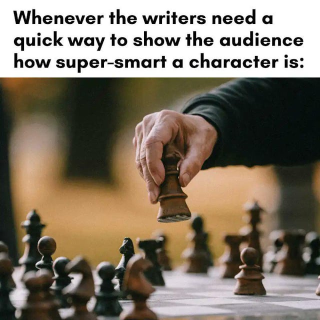 A meme consisting of a top text overlay and a photograph. The text reads: 'Whenever the writers need a quick way to show the audience how super-smart a character is:'. Below the text is a close-up photograph of a human hand (wearing a dark sleeve) in the act of moving a wooden chess piece (likely a pawn) on a chessboard, with other chess pieces blurred in the background. The meme humorously critiques the common writing trope where authors use chess as a shorthand to depict a character's intelligence.