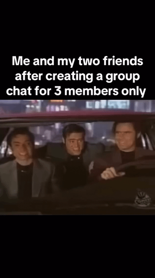 A meme featuring a screenshot from a live-action movie showing three individuals sitting in a car at night. The overlaid text reads 'Me and my two friends after creating a group chat for 3 members only.' The characters appear to be smiling or grinning, conveying a lighthearted and amused reaction to the relatable scenario of forming a small, exclusive group chat with close friends.
