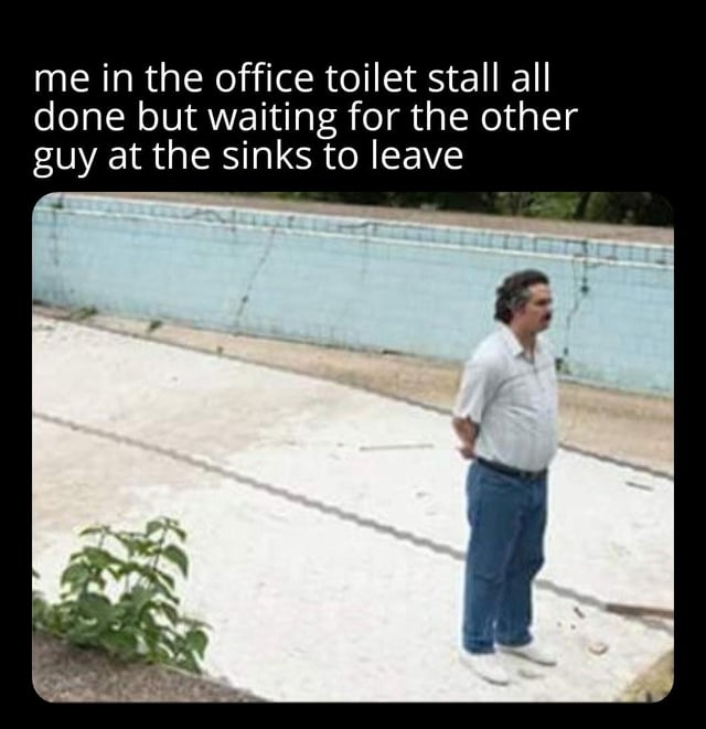This meme consists of a text overlay at the top paired with a reaction image of a middle-aged man standing awkwardly next to a drained, empty outdoor pool with his hands behind his back. The top text reads 'me in the office toilet stall all done but waiting for the other guy at the sinks to leave'. The meme humorously depicts the extremely common relatable social experience of feeling awkward about interacting with a stranger or coworker after using a shared office restroom, so people choose to stay hidden in the stall until the other person leaves to avoid unnecessary small talk or awkward eye contact.