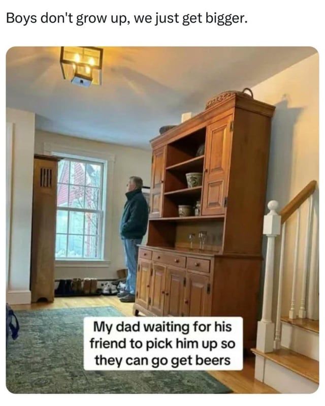 A meme featuring a photograph of an older man (presumably the creator's dad) standing by a window in a cozy indoor setting, looking outside. The top text reads 'Boys don't grow up, we just get bigger.' and a lower caption states 'My dad waiting for his friend to pick him up so they can go get beers.' The image humorously contrasts the adult activity of going for beers with the playful assertion that men retain childlike qualities, creating a relatable and lighthearted joke about male friendships and aging.