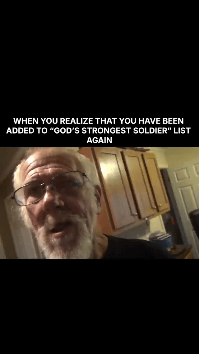 This is a single-panel static reaction meme. It is formatted with black letterbox bars at the top and bottom. The top black bar contains centered white text that reads "WHEN YOU REALIZE THAT YOU HAVE BEEN ADDED TO “GOD’S STRONGEST SOLDIER” LIST AGAIN". Below the text is a low-quality, candid photo of an older white man with white hair, a full white beard, and eyeglasses, standing in a home kitchen with light-colored wooden wall cabinets visible in the background. The man has a tired, exasperated, slightly stunned expression with his mouth slightly open, conveying frustration and weariness at the prospect of facing more unexpected hardship, playing off the common internet joke that references the saying "God gives his toughest battles to his strongest soldiers", used sarcastically when someone experiences repeated unfortunate events.