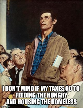 A meme utilizing Norman Rockwell's 1943 painting 'Freedom of Speech' (part of the Four Freedoms series), which portrays a man standing to speak in a town hall setting surrounded by a seated crowd. The original artwork symbolizes democratic discourse. This meme overlays bold white text at the bottom: 'I DON'T MIND IF MY TAXES GO TO FEEDING THE HUNGRY AND HOUSING THE HOMELESS,' repurposing the image to advocate for tax-funded social welfare programs supporting vulnerable populations.