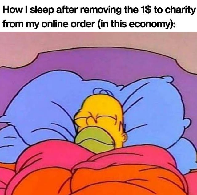 A meme featuring a screenshot from the animated TV show 'The Simpsons' depicting Homer Simpson lying peacefully in bed. Homer is shown with his eyes closed, a content expression, and covered with orange and pink blankets, resting on blue pillows against a purple headboard. Above the image, a text caption reads: 'How I sleep after removing the 1$ to charity from my online order (in this economy):'. The humor stems from satirically portraying the relief of justifying skipping a small $1 charity donation during challenging economic times, using Homer's undisturbed sleep as a comedic representation of guilt-free rationalization.