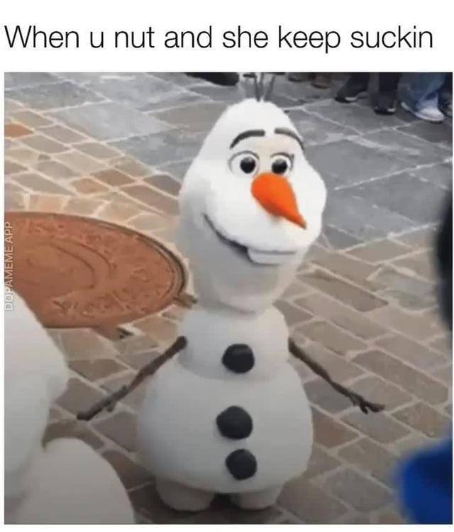 This is a crude single-panel meme featuring a candid photo of an Olaf (from Disney's *Frozen*) mascot costume at a Disney theme park. The costume's proportions accidentally create an exaggerated, suggestive oversized lower body, which is paired with the caption describing the scenario of unexpected continued sexual stimulation after a man climaxes. The meme's original title 'system overload' refers to the feeling of overwhelming overstimulation in this scenario, with Olaf's awkward shape acting as a visual punchline for the crude joke.