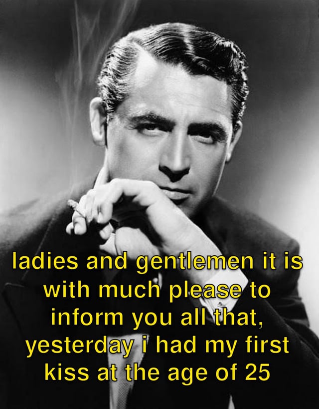 A black and white photograph of a composed vintage Hollywood actor, dressed in a suit, holding a cigarette near his mouth with a serious expression. Overlaid in bold yellow text is a personal announcement: 'ladies and gentlemen it is with much please to inform you all that, yesterday i had my first kiss at the age of 25'. The contrast between the actor's formal demeanor and the lighthearted, relatable milestone creates a humorous and endearing effect, celebrating a personal achievement with irony.