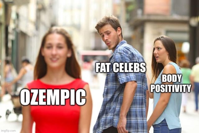 A meme using the 'distracted boyfriend' template featuring three people in an urban street setting. A man in a blue plaid shirt stands between two women: one in a red dress labeled 'OZEMPIC' walking towards the viewer, and another in a light blue top labeled 'BODY POSITIVITY' standing beside him. The man is turned, looking back at the 'BODY POSITIVITY' woman with a distracted expression, while the text 'FAT CELEBS' is overlaid on him. The meme humorously critiques perceived hypocrisy in body positivity discourse, suggesting inconsistency when Ozempic (a weight-loss drug) is involved versus attitudes toward fat celebrities.