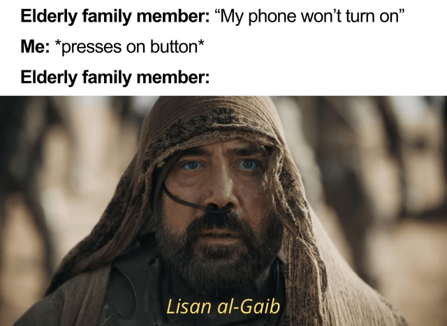 This relatable meme depicts the common experience of being the go-to tech support (nicknamed household CTO) for older family members. The top text sets up the scenario: an elderly family member says their phone won't turn on, the poster simply presses the power button to fix it, and the elderly family member reacts with reverence. The reaction is represented by a still of the character Stilgar from the Dune film franchise, with the text 'Lisan al-Gaib' overlaid at the bottom. Lisan al-Gaib is the term for the prophesied messiah figure that the Fremen people of Arrakis worship, so the joke is that the older relative sees the person who fixed their trivial phone issue as an all-knowing, miraculous figure.