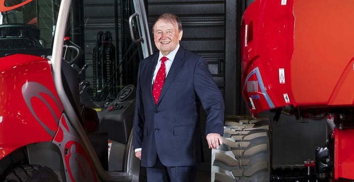 A meme featuring a photograph of Marcel Braud, identified as the inventor of the forklift, standing next to a red forklift in a garage setting. Braud is wearing a blue suit with a red tie and smiling, with one hand resting on the forklift's tire. The accompanying text announces his death at age 93 and includes the internet slang phrase 'Press F foor honnor' (with intentional typos 'foor' and 'honnor' instead of 'for' and 'honor'), referencing the meme tradition of 'Press F to pay respects.'