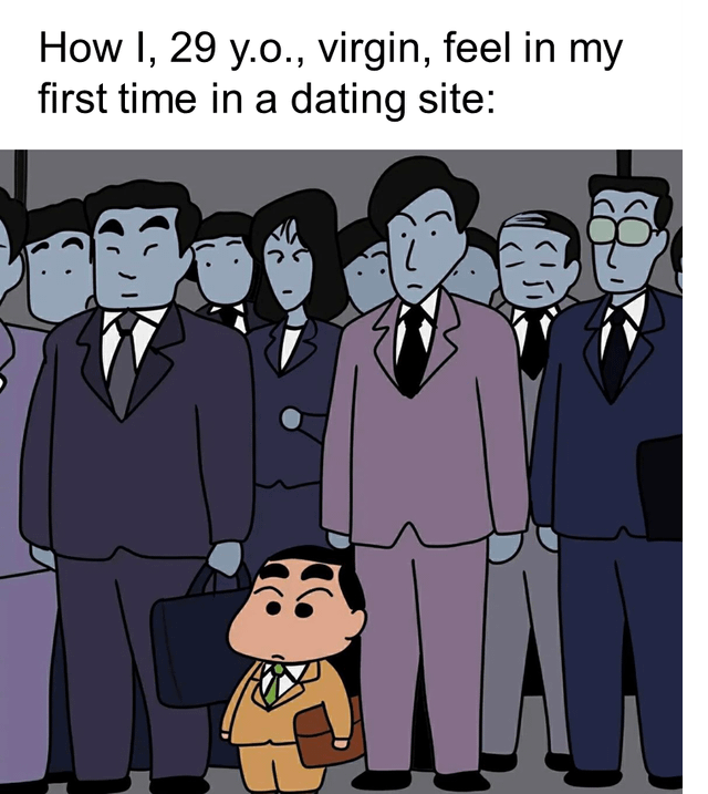 The meme opens with text at the top stating "How I, 29 y.o., virgin, feel in my first time in a dating site:". Below the text, the anime character Shinchan, dressed in a small suit and holding a tiny briefcase, stands looking awkward and out of place among a crowd of much taller, somber, adult blue-skinned office workers in formal suits. The joke uses the visual of a small child surrounded by mature adults to represent the feelings of inexperience, inadequacy, and being out of place that an inexperienced 29 year old virgin has when first entering the online dating scene, where they perceive all other users as far more experienced and mature than themselves.