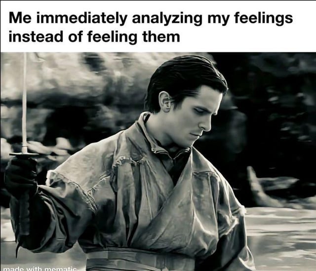 A meme featuring a black-and-white screenshot of a person dressed in traditional clothing (resembling historical or samurai attire) gripping a sword with a serious, focused expression. Above the image, bold text reads: 'Me immediately analyzing my feelings instead of feeling them.' The humor stems from the contrast between the intense, warrior-like demeanor of the character (suggesting readiness for battle or deep concentration) and the relatable, everyday action of over-analyzing one's emotions rather than experiencing them directly. The image is edited with text overlay, and a 'made with mematic' watermark is visible at the bottom.