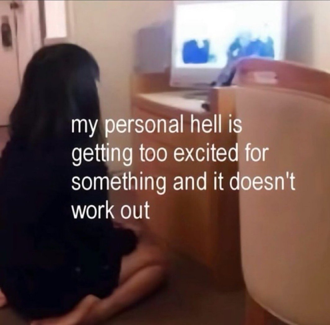 This is a low-resolution, blurry relatable meme. It features a girl with long dark hair sitting on the floor with her back to the camera, facing a television set that is turned on in front of her. White text is overlaid on the center of the image, reading 'my personal hell is getting too excited for something and it doesn't work out'. The meme expresses the common, relatable negative feeling of disappointment that comes when a plan, event, or desired outcome a person was looking forward to fails to happen or falls short of expectations.