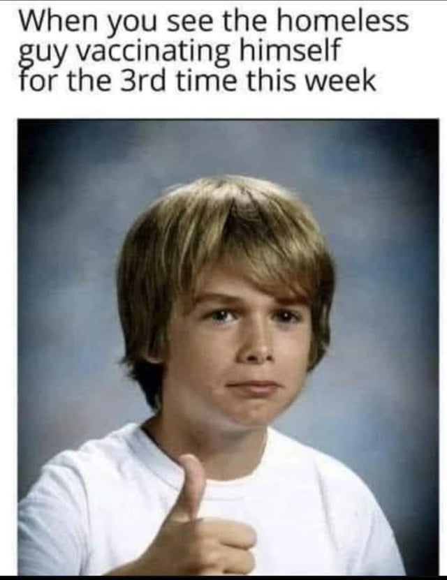 A meme consisting of a top text overlay and a photograph of a young boy with short blonde hair wearing a white shirt. The text reads: 'When you see the homeless guy vaccinating himself for the 3rd time this week'. The boy in the image is giving a thumbs-up with his right hand and has a neutral to slightly confused expression. This meme uses the popular 'Success Kid' (Sammy Griner) template, which originated from a 2007 photograph.