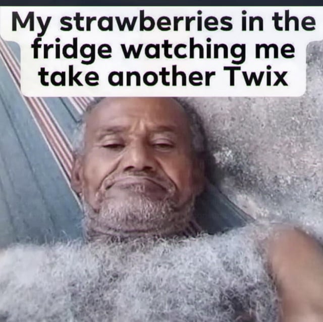 This meme uses a viral image of a frost-covered older man with a disappointed, unimpressed expression to personify forgotten strawberries stored in a refrigerator. The overlaid text reads 'My strawberries in the fridge watching me take another Twix'. The joke is based on the common relatable experience of purchasing healthy produce like strawberries with the intention of eating better, but repeatedly choosing unhealthy junk food like Twix candy bars instead, leaving the fresh produce abandoned and neglected in the cold fridge, implied to be judging the viewer's poor food choices.