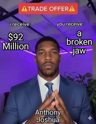 The image features a meme using the 'Trade Offer' template. At the top, a red banner with yellow exclamation marks reads 'TRADE OFFER'. Below the banner, on the left side, the text 'i receive: $92 Million' is displayed, while on the right side, the text 'you receive: a broken jaw' appears. At the bottom center, the name 'Anthony Joshua' is shown. The central figure is Anthony Joshua, a real-life professional boxer, wearing a blue suit with a white shirt and blue tie, standing against a purple-lit background with plants visible behind him. His hands are clasped together in front of his chest, and he has a neutral/serious expression.