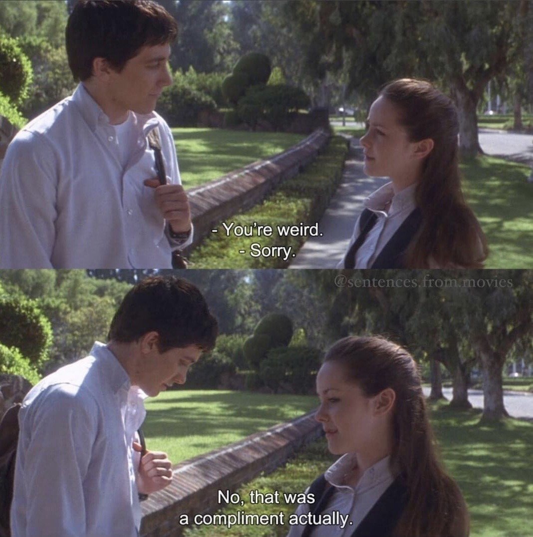 This two-panel meme uses a scene from the 2001 film *Donnie Darko*, depicting an exchange between lead characters Donnie Darko and Gretchen Ross as they stand outside on a sunny, tree-lined path. In the top panel, Gretchen tells Donnie "You're weird." and Donnie automatically apologizes in response. In the bottom panel, Gretchen clarifies that her comment was not an insult, saying "No, that was a compliment actually.", framing Donnie's unusual quirks as a positive trait she appreciates. The meme is widely used to express affectionate appreciation for someone's unique, non-conforming personality or odd behavior, often in romantic or friendly flirting contexts.