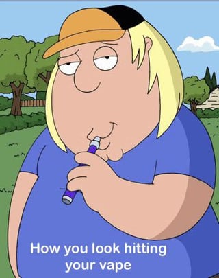 An edited screenshot from the animated TV show 'Family Guy' featuring the character Peter Griffin. He is depicted standing outdoors in a grassy area with trees and a fence in the background, wearing a blue shirt and an orange cap. Peter has a neutral, slightly awkward expression with half-lidded eyes and is holding a purple vape pen to his mouth. At the bottom of the image, a caption reads: 'How you look hitting your vape,' framing Peter's demeanor as a humorous representation of the self-conscious or awkward feeling some people experience while vaping in public.