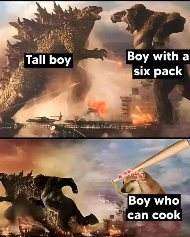 This is a two-panel meme using scenes from the 2021 *Godzilla vs. Kong* film. The first panel shows Godzilla labeled "Tall boy" and King Kong labeled "Boy with a six pack" facing off aggressively in a destroyed, burning city battle scene. The second panel edits the Cheems Shiba Inu meme character (wearing a flower crown and holding a baseball bat) labeled "Boy who can cook" into the frame, with Godzilla and Kong now cowering in fear from Cheems. The joke implies that men who can cook are far more desirable to women than men who are only tall or physically muscular, making the latter two traits appear insignificant by comparison.
