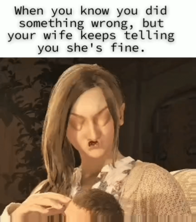 A meme structured with a top text panel and a lower image. The top text reads: 'When you know you did something wrong, but your wife keeps telling you she's fine.' The lower image depicts a female character with long brown hair, wearing a light-colored, patterned top and a knitted cardigan. She has a blank, unsettling expression—half-closed eyes, slightly parted lips—and is gently touching another person's head. The contrast between the reassuring text ('she's fine') and her eerie demeanor humorously exaggerates the relatable scenario of a partner denying their true upset feelings.