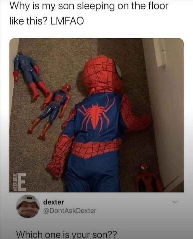This meme consists of a social media post paired with a funny reply. The top of the post has text reading "Why is my son sleeping on the floor like this? LMFAO" above a photograph: a young child wearing a full Spider-Man costume lies face down on a carpeted floor, positioned identically to three smaller Spider-Man action figures that are lying in a row next to him. Below the photo, a comment from user @DontAskDexter (display name dexter) reads "Which one is your son??". The humor comes from the visual gag that the child matches the pose and look of the toys so well it is hard to distinguish which of the four Spider-Man figures on the floor is the actual child.