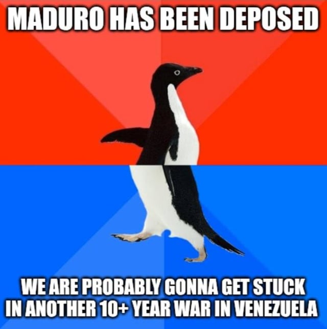 A meme featuring a cartoon penguin centered against a split background: red on the top half and blue on the bottom half. The penguin is standing with one wing slightly raised, facing to the right with a neutral expression. At the top of the image, bold white text reads 'MADURO HAS BEEN DEPOSED', and at the bottom, bold white text states 'WE ARE PROBABLY GONNA GET STUCK IN ANOTHER 10+ YEAR WAR IN VENEZUELA'. The combination of the text and imagery conveys a sarcastic or frustrated tone regarding the potential consequences of political change in Venezuela, implying a cycle of prolonged conflict.