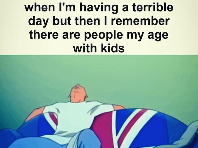 The image consists of two main parts: a top text section and a lower visual section. The top text reads, 'when I'm having a terrible day but then I remember there are people my age with kids,' conveying a humorous sense of relief by comparing one's own struggles to the responsibilities of peers raising children. Below the text is an animated scene featuring a simplified human character (likely male) lying supine on a couch with a Union Jack (British flag) pattern. The character has a relaxed posture, with arms behind their head and legs stretched out, and an expression of calm or contentment, visually reinforcing the relief described in the text.