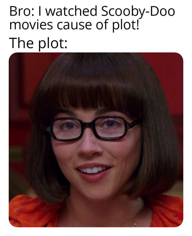 This is a sarcastic single-panel meme playing on the double meaning of the word 'plot'. The top text features a quote from a person claiming they watch live-action Scooby-Doo movies for the narrative plot, followed by text stating 'The plot:' above a close-up still of actress Linda Cardellini portraying the character Velma Dinkley. The joke implies that the real 'plot' people are interested in is the attractive portrayal of Velma, rather than the actual story of the films. Velma is shown wearing her signature short brown bob, black thick-rimmed glasses, and orange top, with a soft smile looking towards the viewer.