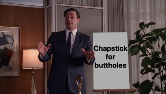 This is a crass relatable meme using a still of the fictional character Don Draper from the TV series *Mad Men*, who appears to be pitching a new product. Next to him is a presentation board with the text "Chapstick for buttholes". The joke ties to the post title referencing "swamp ass season", the period of warm, humid weather where people commonly experience sweaty, irritated buttocks; the meme humorously frames ordinary lip balm as a solution for this uncomfortable bodily irritation.
