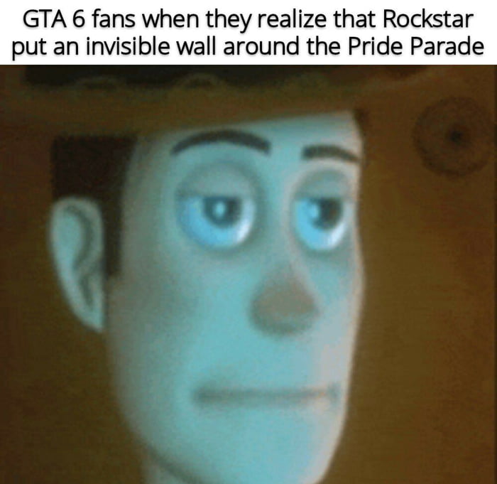 A meme featuring a close-up screenshot of the animated character Andy from Toy Story, displaying a neutral expression with slightly wide eyes. The top text reads: 'GTA 6 fans when they realize that Rockstar put an invisible wall around the Pride Parade.' The humor satirizes the common gaming frustration of 'invisible walls' (artificial barriers restricting player movement) being humorously applied to a Pride Parade scenario, implying fan annoyance at perceived overrestrictive game design.