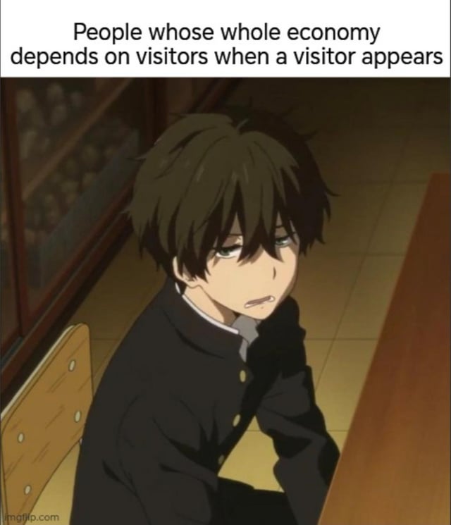 This is a single-panel reaction meme. The top of the image has a text caption describing people whose local economy is entirely reliant on tourist visitors, followed by an anime screenshot of Houtarou Oreki from Hyouka looking extremely annoyed and unenthusiastic. The joke is a sarcastic observation that tourist-dependent communities often act inconvenienced and irritated by the very visitors that support their livelihood, creating a humorous contrast between their economic needs and their displayed attitude.