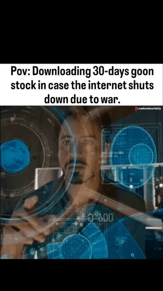 This meme combines a screenshot from the *Iron Man* (Marvel Cinematic Universe) film series, featuring Tony Stark (Robert Downey Jr.) intently interacting with his advanced holographic digital interface, with a humorous top caption. The text reads: *Pov: Downloading 30-days goon stock in case the internet shuts down due to war.* The joke centers on the relatable (and absurd) idea of preparing for a potential internet outage caused by conflict by hoarding 'goon stock'—internet slang for adult/NSFW digital content. The serious, focused demeanor of Tony Stark in the image contrasts with the silly, specific emergency preparation, amplifying the comedic effect.