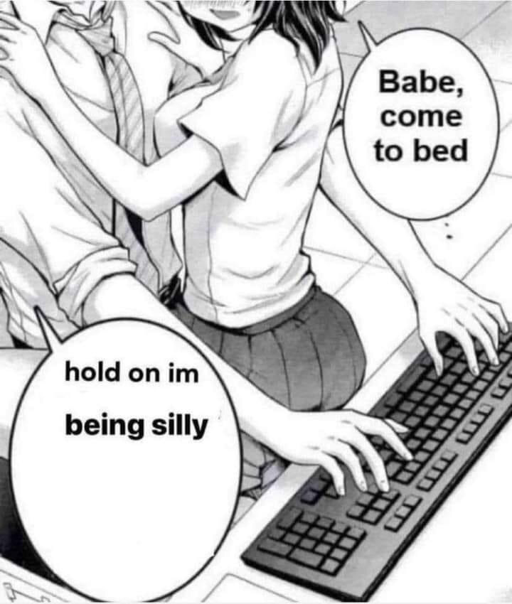 This is a black and white edited manga panel meme. It shows a female manga character sitting on her male partner's lap, leaning forward to type on a computer keyboard placed on a desk. The male character says 'Babe, come to bed' in a speech bubble, while the female character replies 'hold on im being silly'. The joke is relatable to people who prioritize engaging in trivial, fun online activities over spending intimate time with their romantic partners.