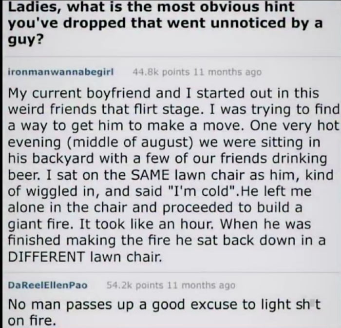A screenshot of a social media post featuring a question asking women to share obvious hints unnoticed by men. The post includes a top comment from 'ironmanwannabegirl' describing a scenario where she sat in the same lawn chair as her then-friend and said 'I'm cold' on a hot August evening, only for him to build a large fire instead of moving closer. A subsequent comment from 'DaReelEllenPao' humorously notes, 'No man passes up a good excuse to light sh*t on fire,' highlighting the relatable miscommunication in relationships.