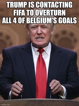 This is a satirical meme featuring a photograph of former United States president Donald Trump standing behind a public speaking podium with an emphatic, frustrated expression. Large bold white text is overlaid at the top of the image, stating 'TRUMP IS CONTACTING FIFA TO OVERTURN ALL 4 OF BELGIUM'S GOALS'. The joke satirizes Trump's well-documented history of disputing and attempting to overturn official results he disagrees with, applying that pattern humorously to a FIFA World Cup football match where Belgium scored 4 goals, implying he is trying to get those match results invalidated.