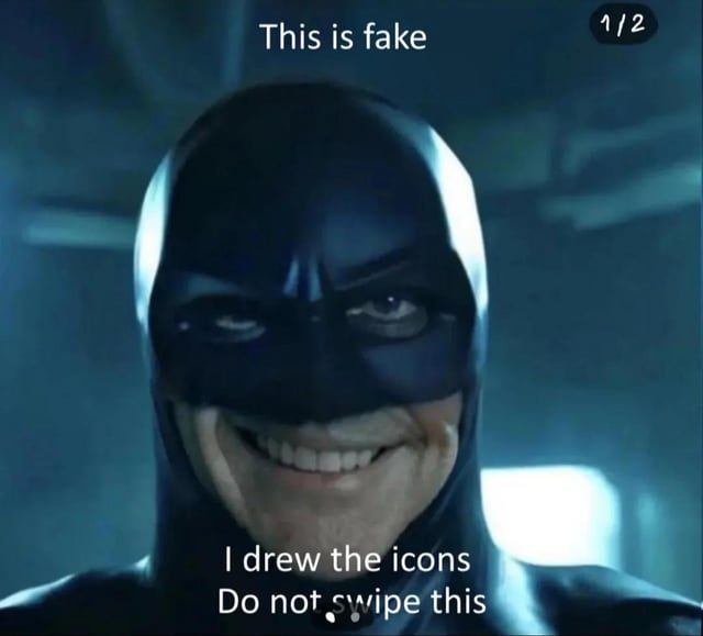 The image features the widely used meme shot of George Clooney as Batman from the 1997 *Batman & Robin* film, grinning widely in a mischievous expression against a dark, blue-toned background. White text is overlaid at the top reading 'This is fake', and text at the bottom reads 'I drew the icons Do not swipe this'. A '1/2' marker is present in the top right corner, indicating this is the first slide in a 2-slide carousel post. The post is a troll, as the text asking users not to swipe is intended to encourage viewers to swipe to the second slide to see the supposedly drawn icons the text references.