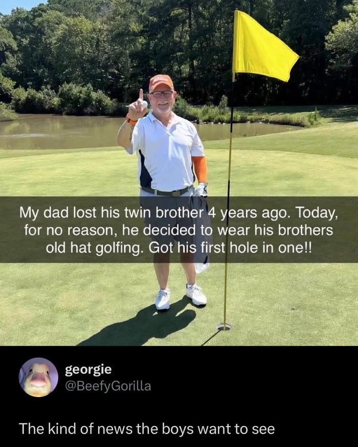A heartwarming image featuring a man standing on a golf green, holding a golf ball with his index finger raised in a celebratory gesture. He is positioned next to a yellow flagstick, wearing a white polo shirt, orange cap, and white golf shoes. The background includes a grassy golf course with trees and a small pond. Overlaid text on the image reads: 'My dad lost his twin brother 4 years ago. Today, for no reason, he decided to wear his brothers old hat golfing. Got his first hole in one!!' Below the image, there is a user avatar (depicting a duck), the username 'georgie', the handle '@BeefyGorilla', and additional text: 'The kind of news the boys want to see'.