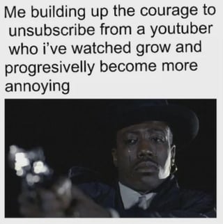 A meme consisting of a top text overlay and a lower image. The text reads: 'Me building up the courage to unsubscribe from a youtuber who i’ve watched grow and progressively become more annoying'. The image shows a real man with a serious, intense expression, likely from a dramatic movie scene, holding a gun with a tense posture. The humor arises from the exaggerated contrast between the character's intense, life-or-death demeanor and the trivial action of unsubscribing from a YouTuber, highlighting the relatable struggle of letting go of long-followed content creators whose content has declined.