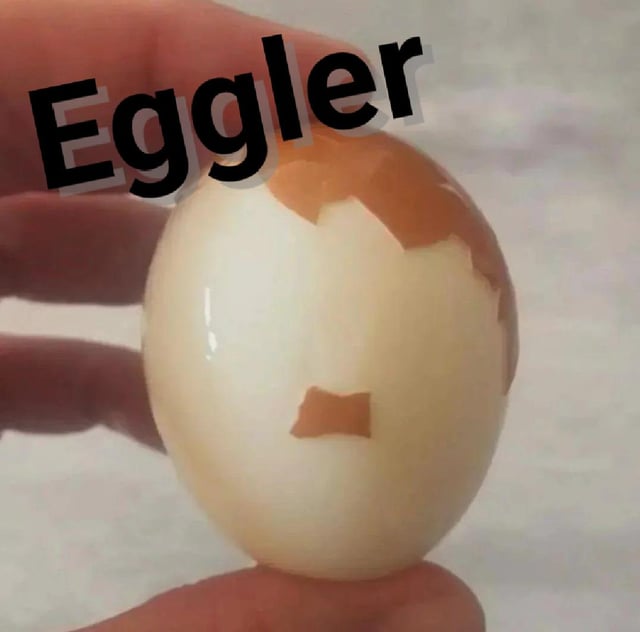 This is a silly pun meme featuring a partially peeled boiled egg held between two human fingers. The remaining brown eggshell patches accidentally form the shape of a receding male hairline on top of the egg, and a small mustache on the lower half, making the egg look exactly like an older man's face. The text 'Eggler' is overlaid across the top of the image, and the original post title 'Hellof Eggler' is a meme-style misspelling of 'Hello, Eggler' as the name for this egg-man.