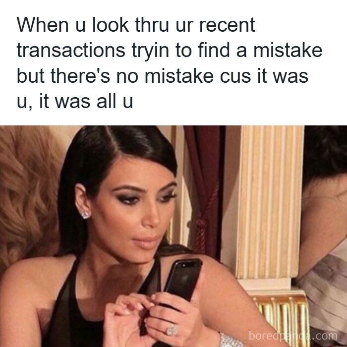 This meme features a block of text at the top followed by a candid photograph of Kim Kardashian. The top text reads "When u look thru ur recent transactions tryin to find a mistake but there's no mistake cus it was u, it was all u". Kim Kardashian is shown staring down at her smartphone with a somber, disappointed, defeated expression, perfectly matching the feeling of realizing you are entirely responsible for your own overspending and there are no billing errors to dispute to get your money back.