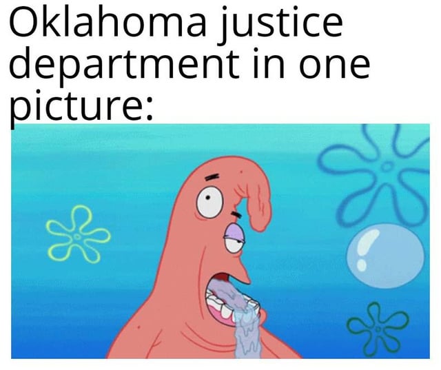 The meme consists of two main parts: a top text overlay reading 'Oklahoma justice department in one picture:' and a screenshot from the animated TV show *SpongeBob SquarePants* below. The screenshot features Squidward Tentacles, a pink, anthropomorphic octopus with a long nose, wide eyes, and an open mouth vomiting a stream of liquid. The background is an underwater scene with blue hues and flower-shaped plants, typical of the show's Bikini Bottom setting. The combination implies the Oklahoma justice department is being mocked as unpleasant or corrupt, using Squidward's disgusted vomiting reaction as a visual metaphor.