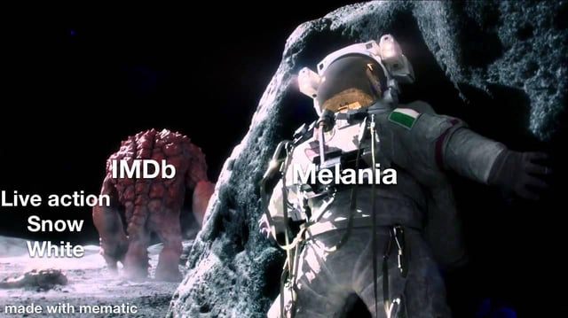 A meme image featuring a sci-fi/fantasy scene with two main elements: a large, red, rocky creature labeled 'IMDb' in the background and an astronaut in a white spacesuit labeled 'Melania' leaning against a rock in the foreground. The left side of the image displays the text 'Live action Snow White'. A watermark 'made with mematic' is present at the bottom. The meme appears to satirize the 'live action Snow White' adaptation by humorously associating the characters with IMDb (a media database) and Melania (likely referencing Melania Trump).