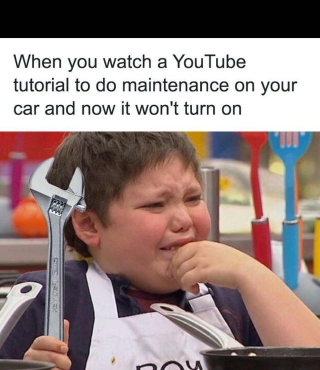 The meme features a two-part layout: a top text box with the caption 'When you watch a YouTube tutorial to do maintenance on your car and now it won't turn on' and a bottom image of a young child with short brown hair, wearing a white apron with 'BOY' partially visible. The child has a distressed, crying expression, holding a wrench in one hand and the other hand near their mouth. The background includes colorful kitchen utensils (spatulas, forks) and a blurred kitchen setting. The humor stems from the relatable scenario of attempting DIY car repair via a YouTube tutorial, only to end up with a non-functional car, embodied by the child's overwhelmed reaction.