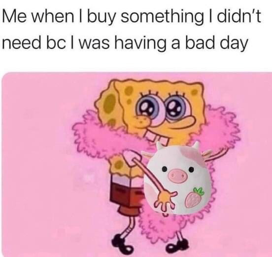 This single-panel relatable meme features an edited version of SpongeBob SquarePants with large sparkling adoring eyes, wearing bright pink feather boas, grinning widely as he proudly holds up a strawberry-themed cow Squishmallow plush against a plain pink background. The text above the visual reads 'Me when I buy something I didn't need bc I was having a bad day', which humorously captures the common, relatable experience of using impulsive unnecessary shopping as a coping mechanism to feel better during a bad day.