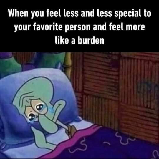 This is a relatable sad meme composed of two parts: white text on a black background at the top, and a screenshot from the animated series SpongeBob SquarePants below. The top text reads 'When you feel less and less special to your favorite person and feel more like a burden'. The lower image shows the character Squidward Tentacles lying in his bed, holding his head with one hand, with visible tears in his large, sad eyes, looking extremely dejected and upset, perfectly matching the sad, insecure feeling described in the text.