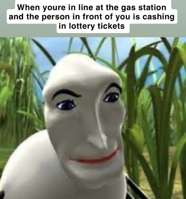 A meme featuring a close-up of the animated character Lord Farquaad from the film 'Shrek' with a distinctively smug and slightly menacing expression. The character has pale skin, raised eyebrows, and a small, upturned smile. Behind him is a blurred background of tall green grass. At the top of the image, there is a white text caption that reads: 'When you're in line at the gas station and the person in front of you is cashing in lottery tickets'. The meme humorously conveys the feeling of impatience and frustration when waiting for someone to complete a slow, tedious task in an everyday setting.