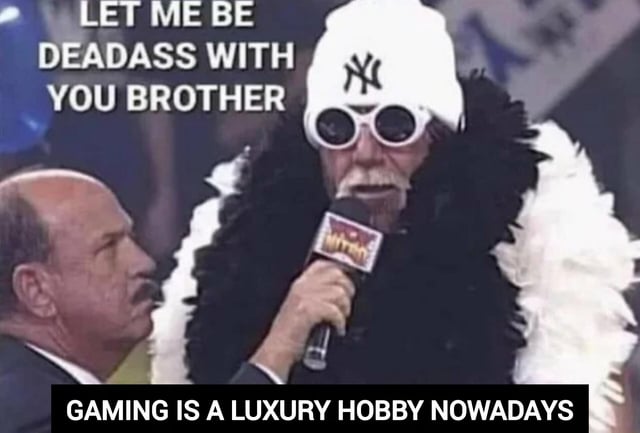 This meme uses the popular 'let me be deadass with you brother' reaction format to comment on the rising cost of gaming. It features an eccentrically dressed man wearing a white New York Yankees beanie, round white sunglasses, and a black and white feather boa speaking into a WWE microphone, with a bald suited man looking at him in confusion. The top text reads 'LET ME BE DEADASS WITH YOU BROTHER', and the bottom text states 'GAMING IS A LUXURY HOBBY NOWADAYS', joking that increasing prices of consoles, video games, and gaming accessories have made the hobby unaffordable for average people, aligning with the core theme that console costs keep rising over time.
