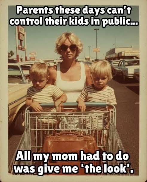 A vintage photograph depicting a woman (likely a mother) pushing a shopping cart with two young children standing inside. The children, wearing matching striped shirts, have serious expressions, while the mother appears neutral. The background features parked vintage cars, suggesting a mid-20th century setting. Overlaid text contrasts modern and past parenting: the top text reads 'Parents these days can't control their kids in public...' and the bottom text reads 'All my mom had to do was give me 'the look'.' The meme humorously highlights nostalgia for a simpler parenting method where a stern glance ('the look') sufficed to manage children's behavior.