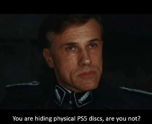 This meme uses a well-known still of the character Hans Landa from the Quentin Tarantino film *Inglourious Basterds*, taken from an interrogation scene where Landa confronts people he suspects are hiding something. A caption added below the image reads 'You are hiding physical PS5 discs, are you not?', paired with the character's sharply accusatory, knowing expression. The joke, titled 'Sony in 2028', satirizes Sony's well-documented trend of moving away from physical video game media to push digital-only PlayStation ecosystems, implying that by 2028 owning physical PS5 discs will be treated as something forbidden that Sony will crack down on.
