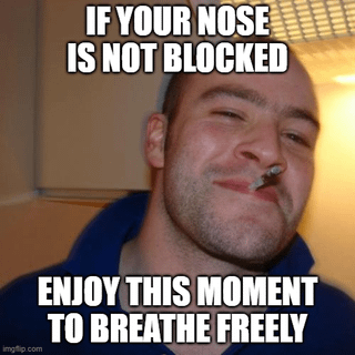 A meme image featuring a real person with a relaxed, smiling expression, seemingly enjoying a moment of unobstructed breathing. The image has bold white text overlaid at the top and bottom: 'IF YOUR NOSE IS NOT BLOCKED' (top) and 'ENJOY THIS MOMENT TO BREATHE FREELY' (bottom). The background appears to be an indoor setting, possibly a bathroom, with a ceiling vent visible. The person's demeanor suggests contentment, reinforcing the meme's lighthearted message about appreciating the simple pleasure of clear nasal breathing. A small 'imgflip.com' watermark is present in the bottom corner, indicating the use of the Imgflip meme generator.